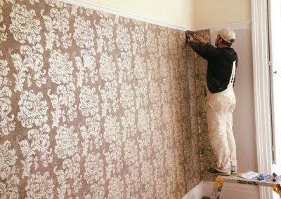 putting up wallpaper