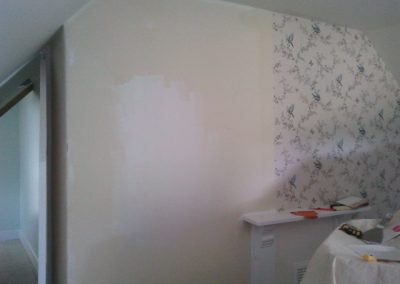 putting up wallpaper