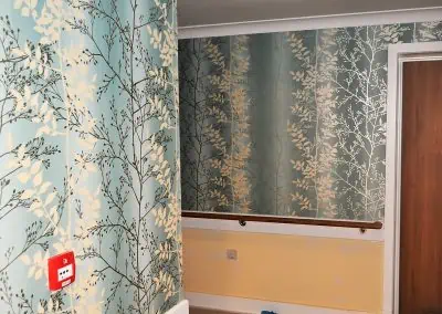 blue wallpaper in hall