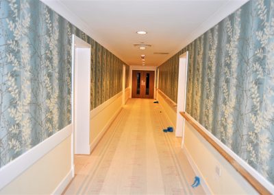 blue corridor with wallpaper