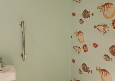 wallpapering bathroom