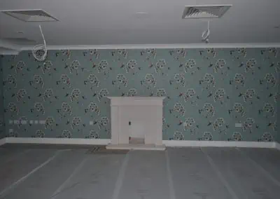 featured fireplace on blue wall