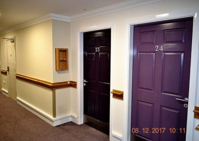 multi coloured front doors in hall