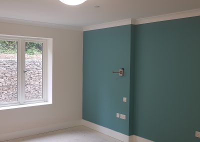 Dark teal freshly painted wall