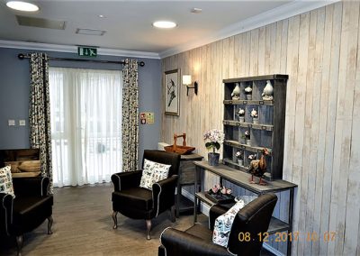 smart seating area with panelled wallpaper
