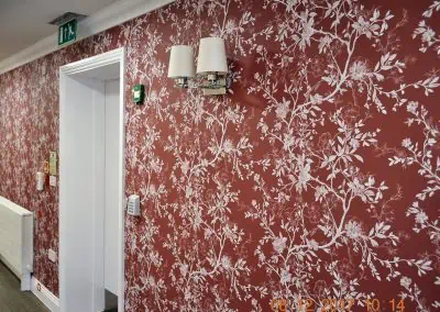 red flowery wallpaper